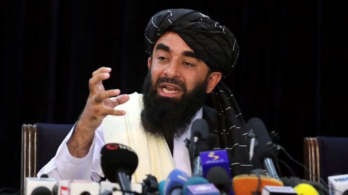 Taliban-Sprecher Sabiullah Mudschahid schlägt versöhnliche Töne an.