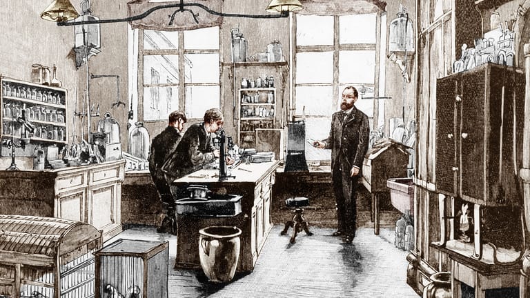 Historischer Stich: Robert Koch (r.), der Entdecker des Cholera-Erregers, in seinem Labor.