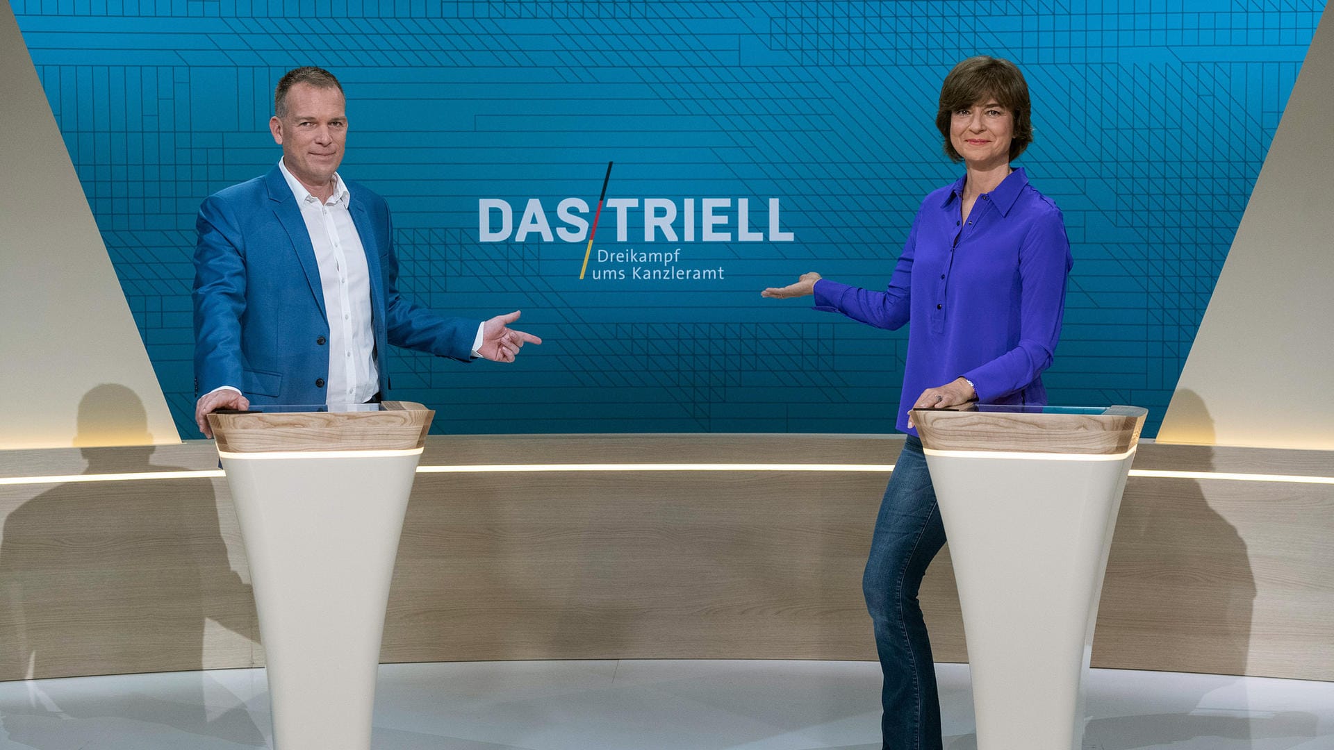 "Das Triell": Oliver Köhr und Maybrit Illner moderieren den Dreikampf zwischen Baerbock, Scholz und Laschet.