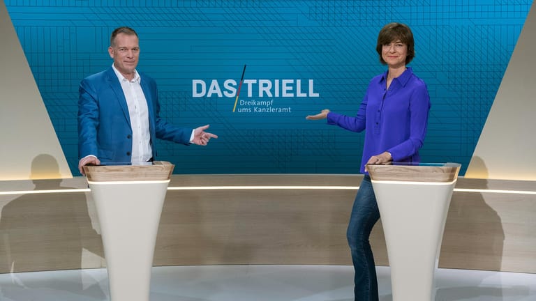"Das Triell": Oliver Köhr und Maybrit Illner moderieren den Dreikampf zwischen Baerbock, Scholz und Laschet.