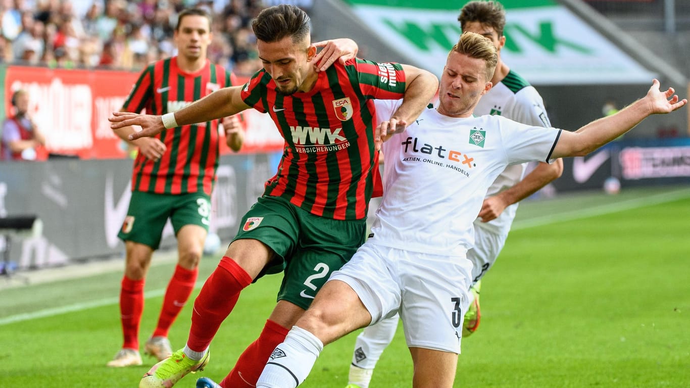 Bundesliga: Augsburg und Gladbach lieferten sich eine enge Partie, am Ende setzte sich der FCA knapp durch.