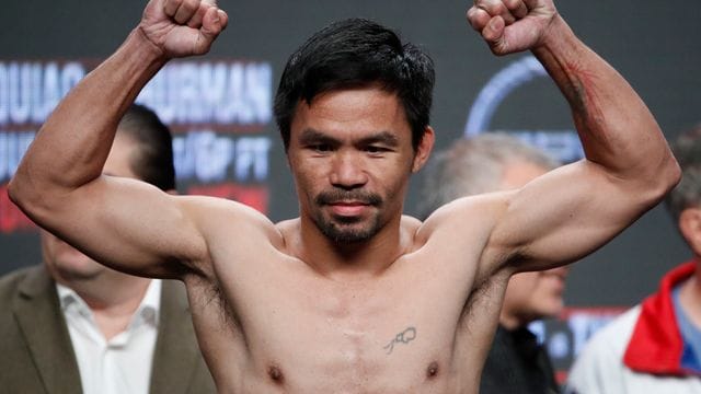 Der philippinische Boxer Manny Pacquiao hört mit dem Profisport auf. Der philippinische Boxer Manny Pacquiao hört mit dem Profisport auf.