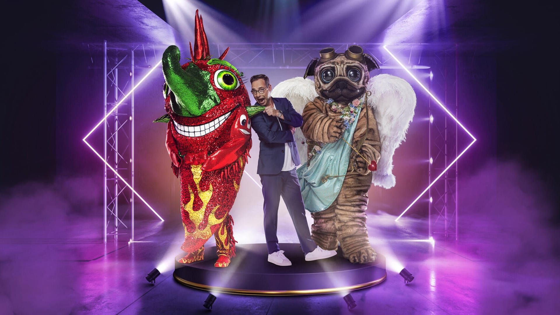 "The Masked Singer" geht wieder los: die Chili und der Mops mit Moderator Matthias Opdenhövel.