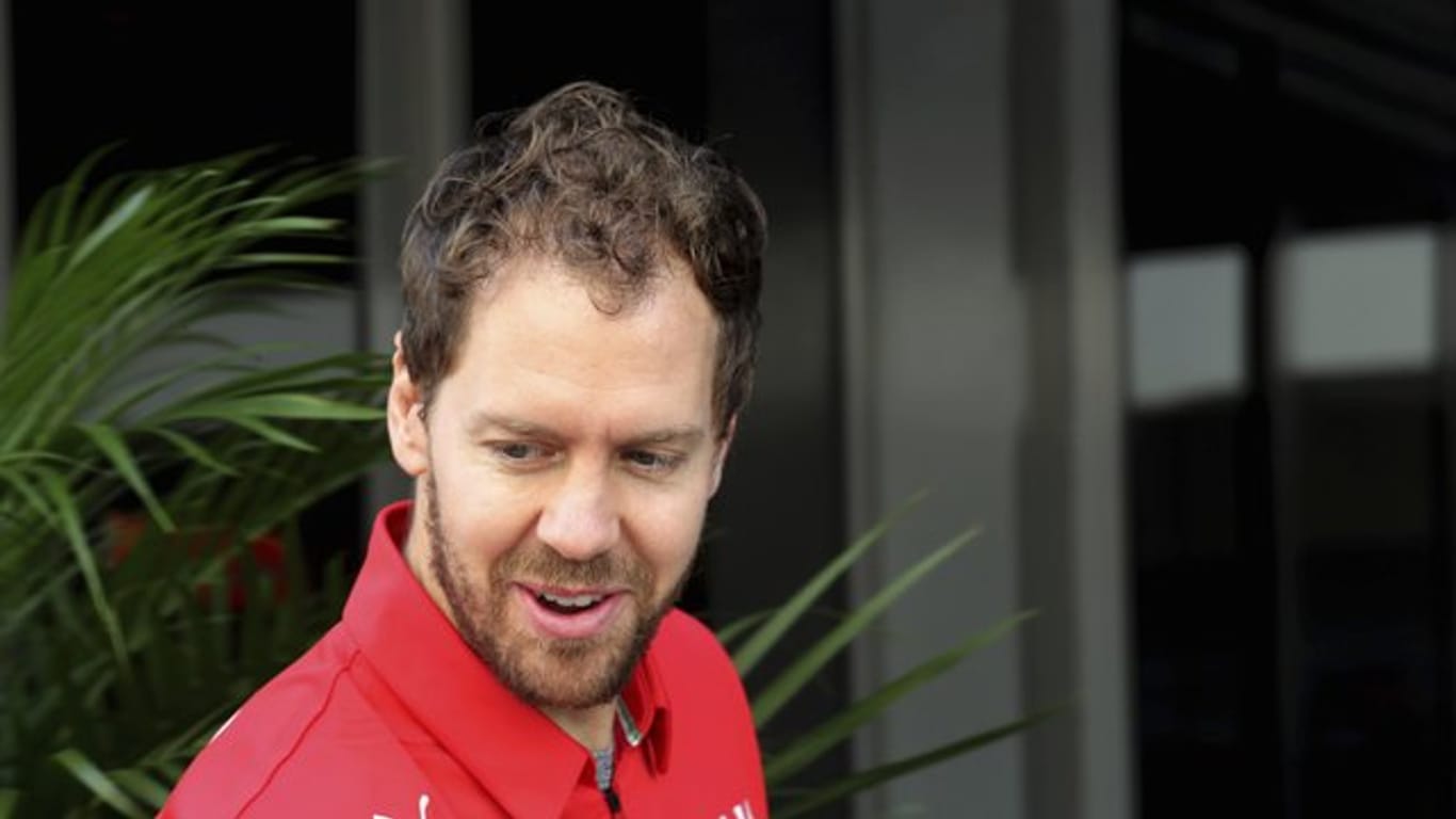 Freut sich über seinen neuen Dienstwagen: Ferrari-Pilot Sebastian Vettel.