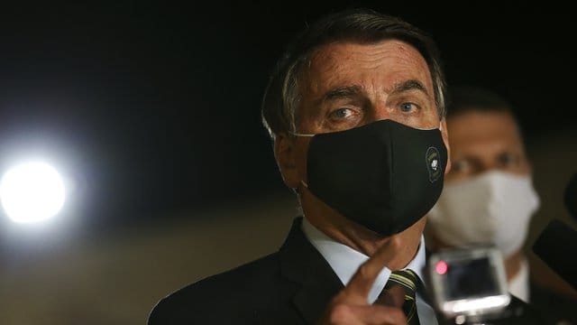 "Brauchen keine Leute von außerhalb, die uns Tipps bei der Gesundheit hier geben": Brasiliens Präsident Jair Bolsonaro. "Brauchen keine Leute von außerhalb, die uns Tipps bei der Gesundheit hier geben": Brasiliens Präsident Jair Bolsonaro.