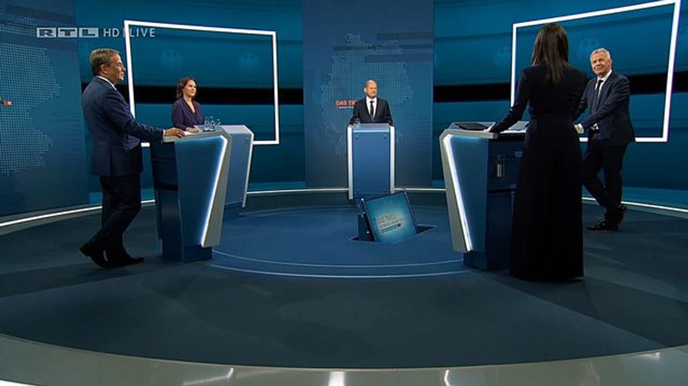 Triell im TV: Die Kanzlerkandidaten Armin Laschet (v.