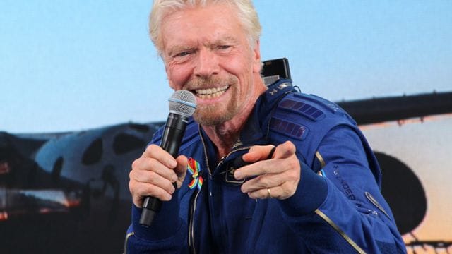 Richard Branson, Unternehmer aus Großbritannien, beantwortet während einer Pressekonferenz im Spaceport America Fragen.