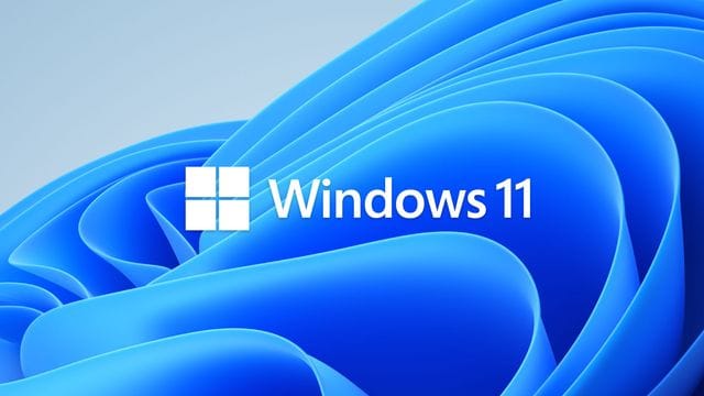 Das Windows 11-Logo mit blauem Hintergrund.