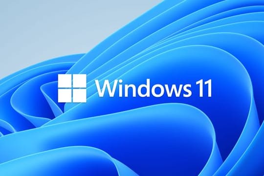 Das Windows 11-Logo mit blauem Hintergrund.