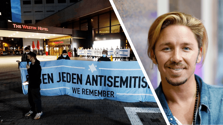 Gil Ofarim hat über Antisemitismus im "Westin Leipzig" berichtet: Nachdem er seine Anschuldigungen öffentlich machte, fand eine Demo vor dem Hotel statt; Hotelmitarbeiter hielten währenddessen ein eigenes Banner (links im Hintergrund) hoch.