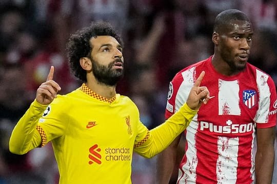 Mohamed Salah (l) sorgte für Liverpools Siegtreffer bei Atlético Madrid.