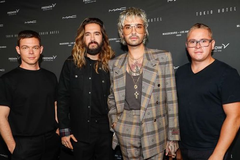 Georg Listing (l-r), Tom Kaulitz, Bill Kaulitz und Gustav Schäfer beim zum Tokio Hotel-Event in Berlin.