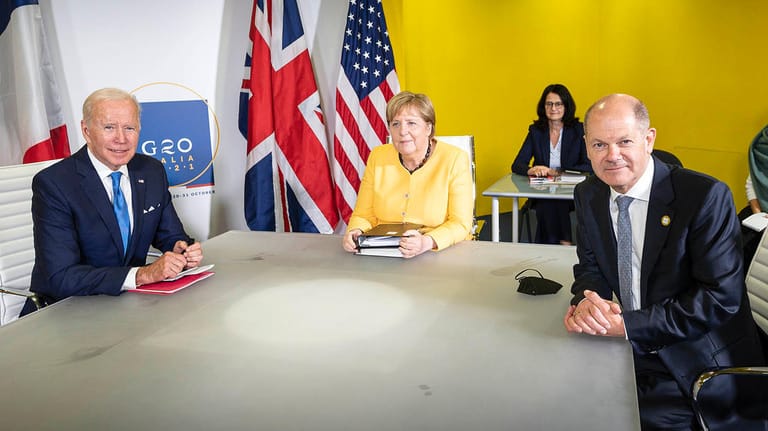 Angela Merkel und Olaf Scholz treffen US-Präsident Joe Biden: Die EU und die USA haben sich überraschend im Handelskonflikt um Stahl- und Aluminiumexporte geeinigt.