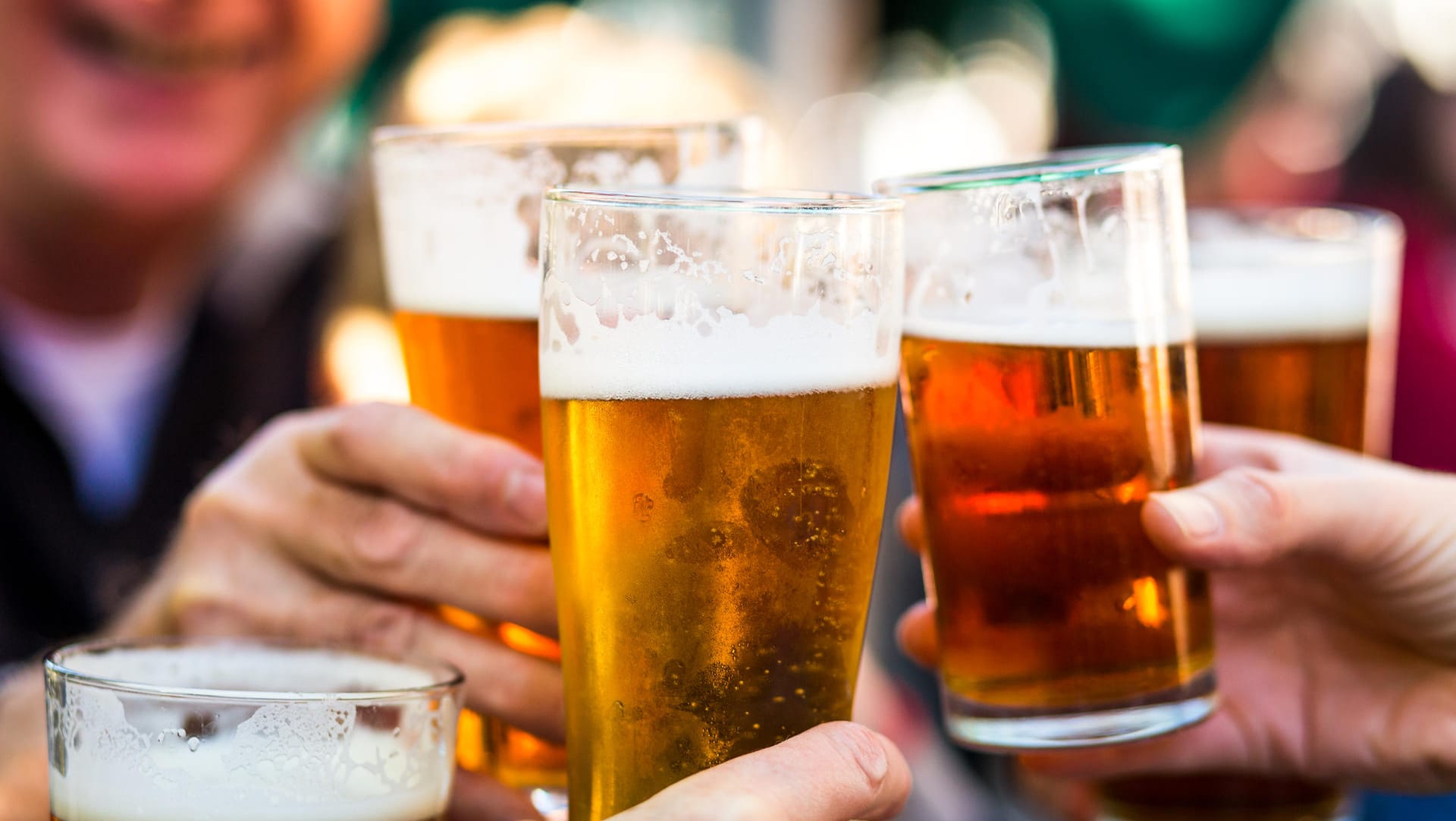 Cheers Celebration Toast with Pints of Beer