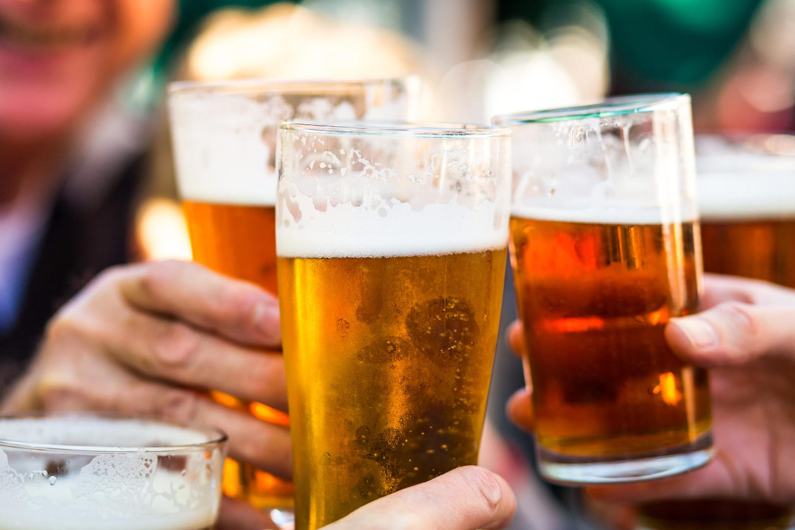 Cheers Celebration Toast with Pints of Beer