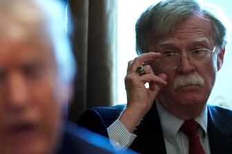 Bolton listens as Trump holds a cabinet meeting at the White House in Washington