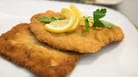 Schnitzel: Für viele Menschen gibt es bei Hunger keine bessere Vorstellung als ein Schnitzel mit Kartoffelsalat oder Pommes frites.