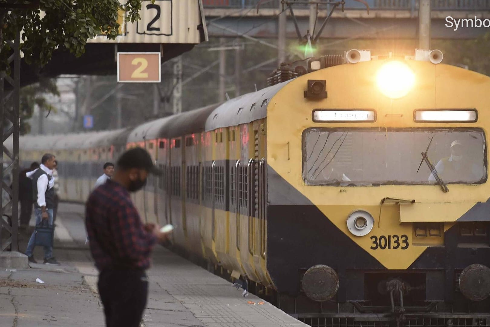 NEW DELHI, INDIA - FEBRUARY 22: A suburban passenger train running between Hazrat Nizamuuddin to Kurukshetra at Tilak Br
