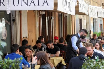 Bars and restaurants reopen as Italy eases COVID-19 restrictions, in Rome