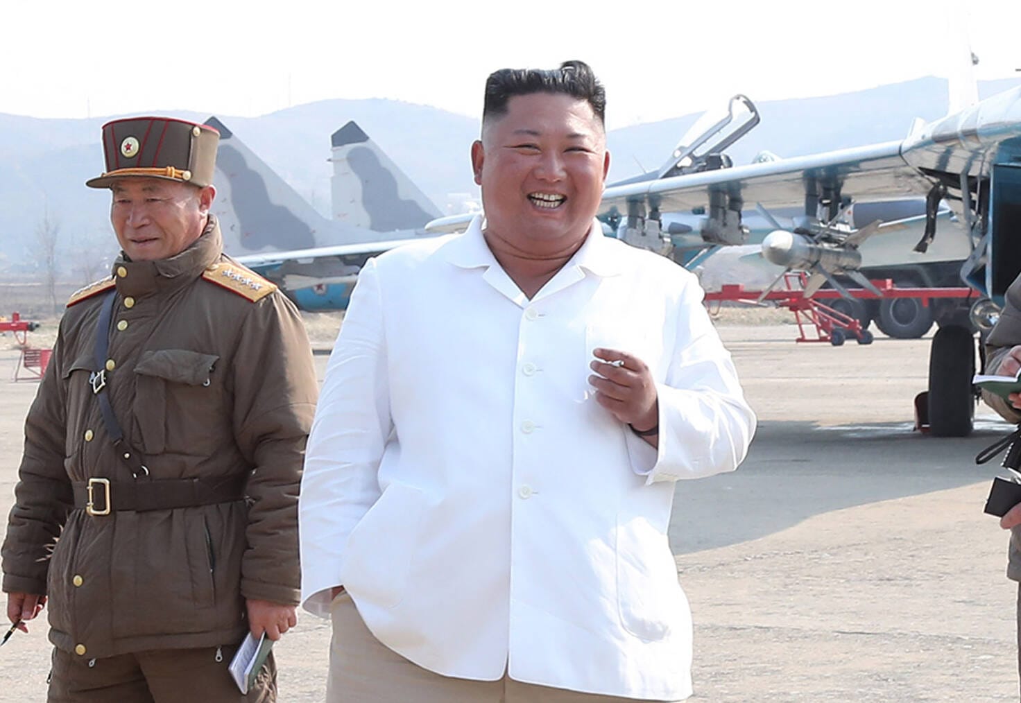 April 21, 2020: FILE: North Korean leader KIM JONG-UN (R) inspects a pursuit assault plane group under the Air and Anti-