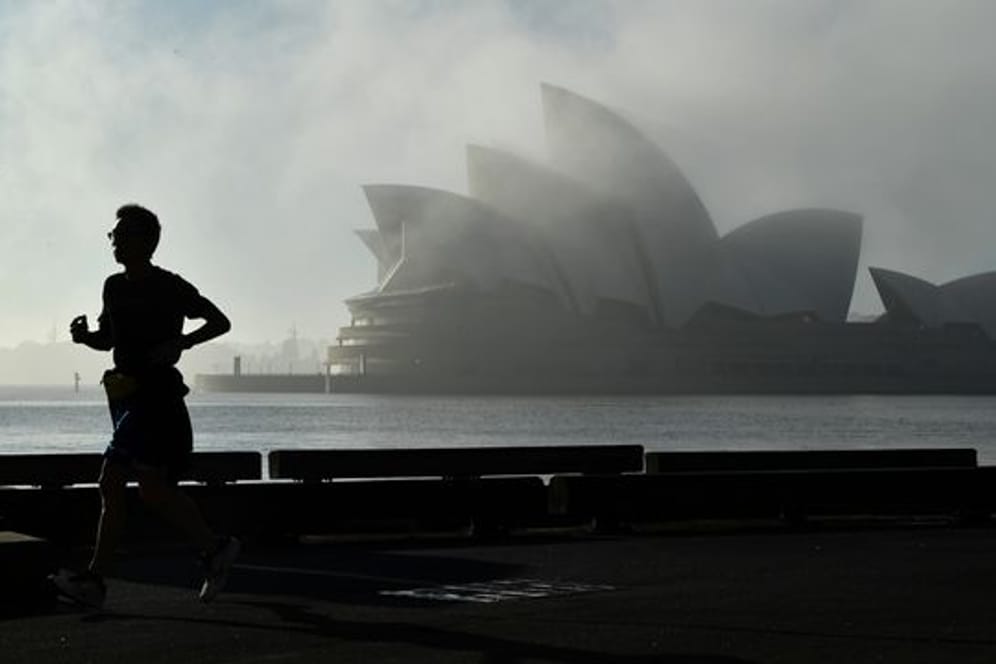 Morgennebel über dem Opernhaus in Sydney: Ein mühsamer Weg aus dem Lockdown.