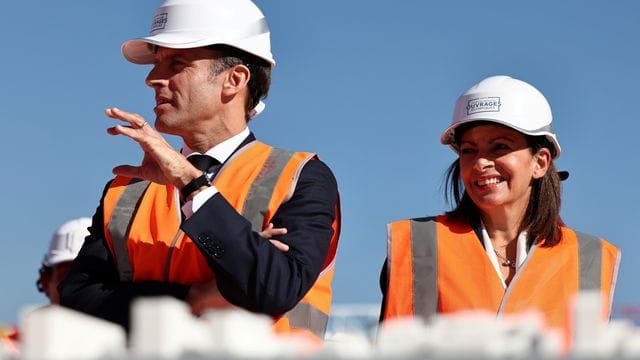 Anne Hidalgo an der Seite von Frankreichs Präsident Emmanuel Macron. Anne Hidalgo an der Seite von Frankreichs Präsident Emmanuel Macron.