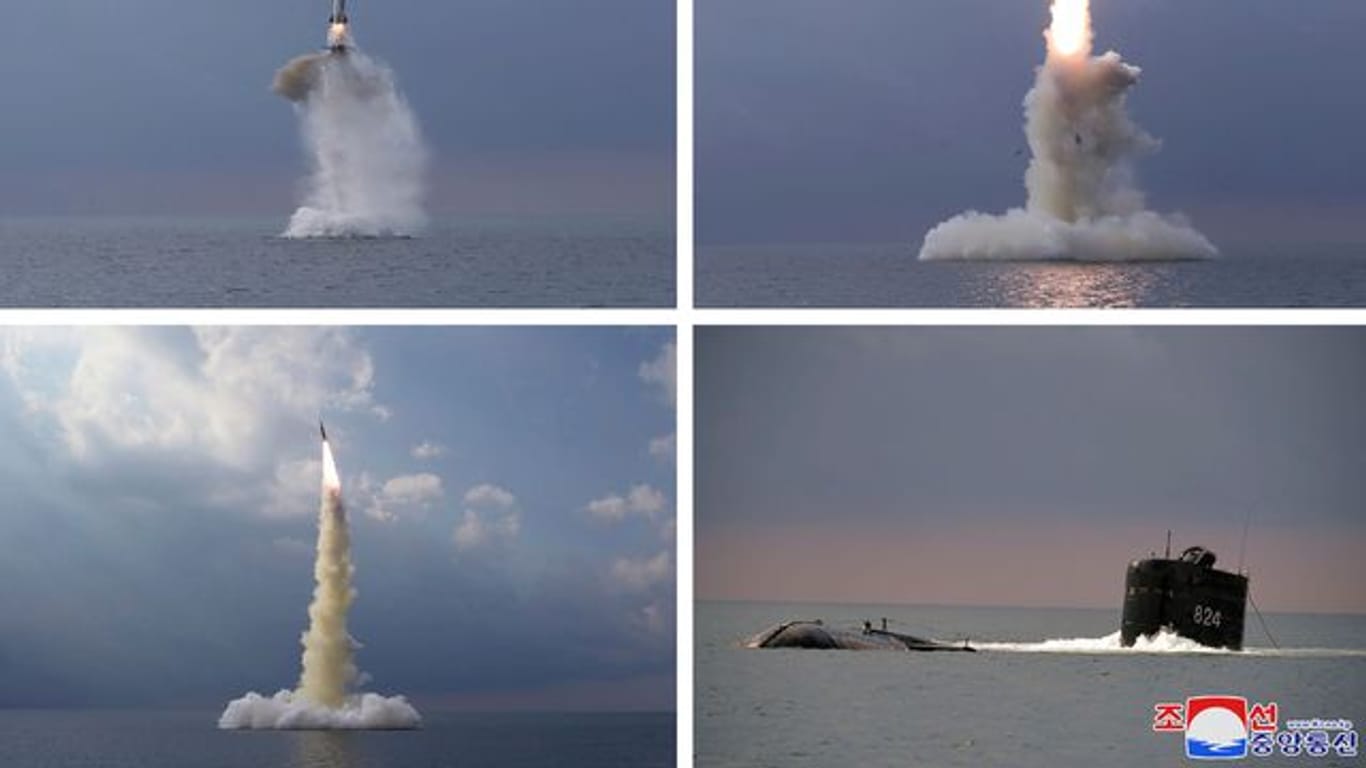 Diese Kombination von vier Fotos, die von der nordkoreanischen Regierung zur Verfügung gestellt wurden, zeigt eine ballistische Rakete, die in Nordkorea von einem U-Boot aus gestartet wurde.