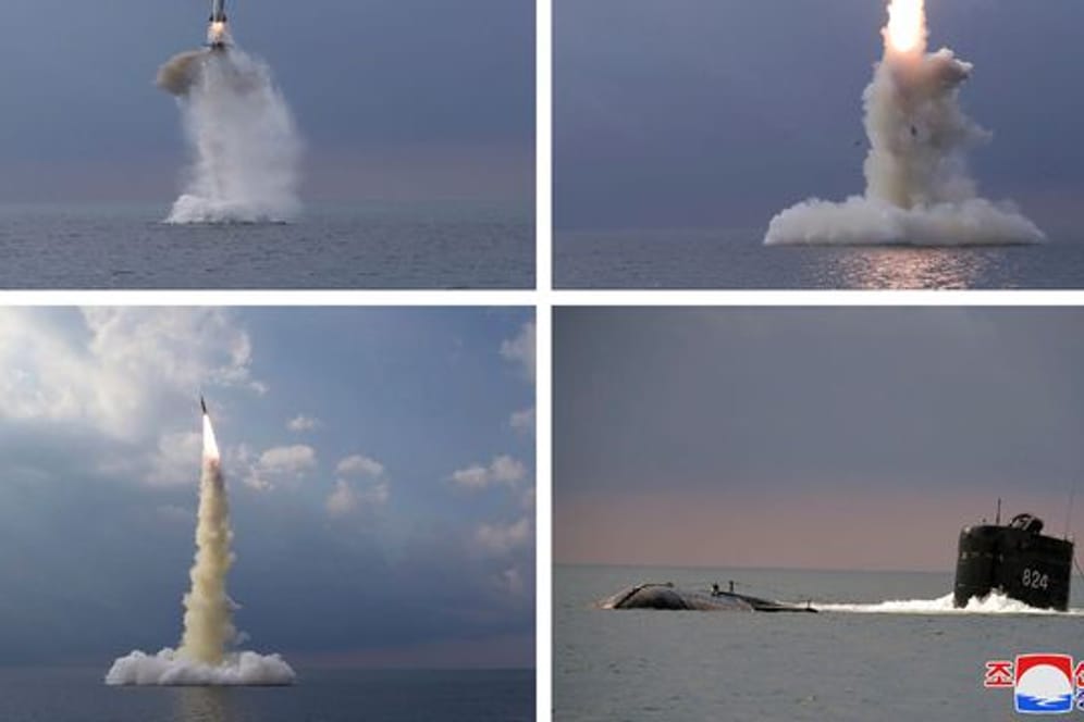 Diese Kombination von vier Fotos, die von der nordkoreanischen Regierung zur Verfügung gestellt wurden, zeigt eine ballistische Rakete, die in Nordkorea von einem U-Boot aus gestartet wurde.