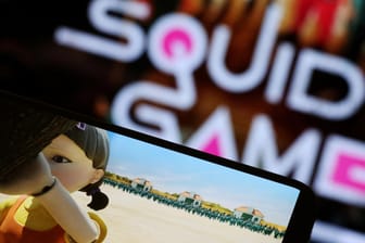FILE PHOTO: The Netflix series "Squid Game" is played on a mobile phone in this picture illustration