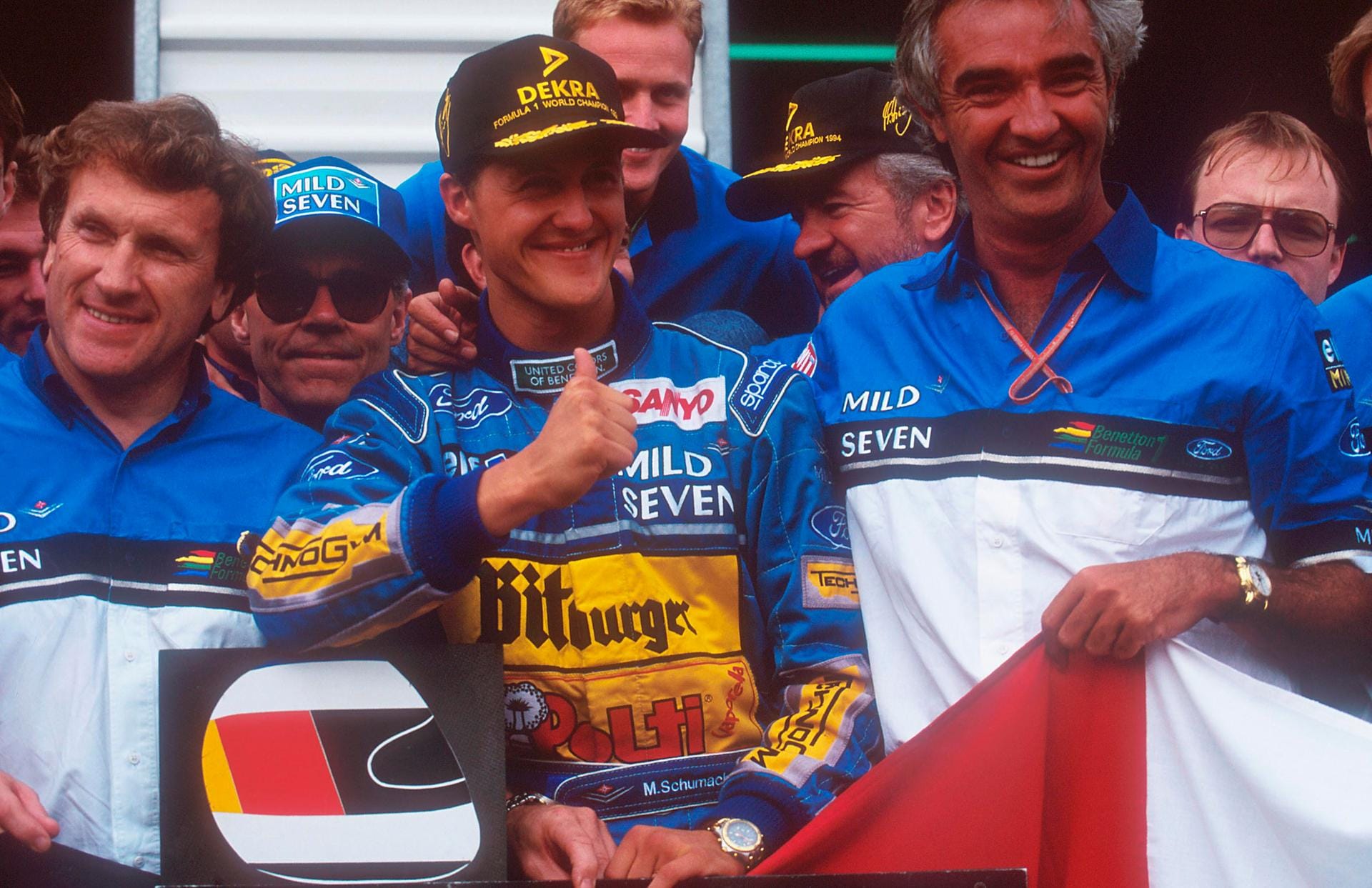 Flavio Briatore (r.): Der Benetton-Teamchef holte Schumacher 1991 zum Rennstall. Gemeinsam feierten die beiden die größten Erfolge ihrer bisherigen Karrieren: Die beiden WM-Titel für Schumi 1994 und 1995.