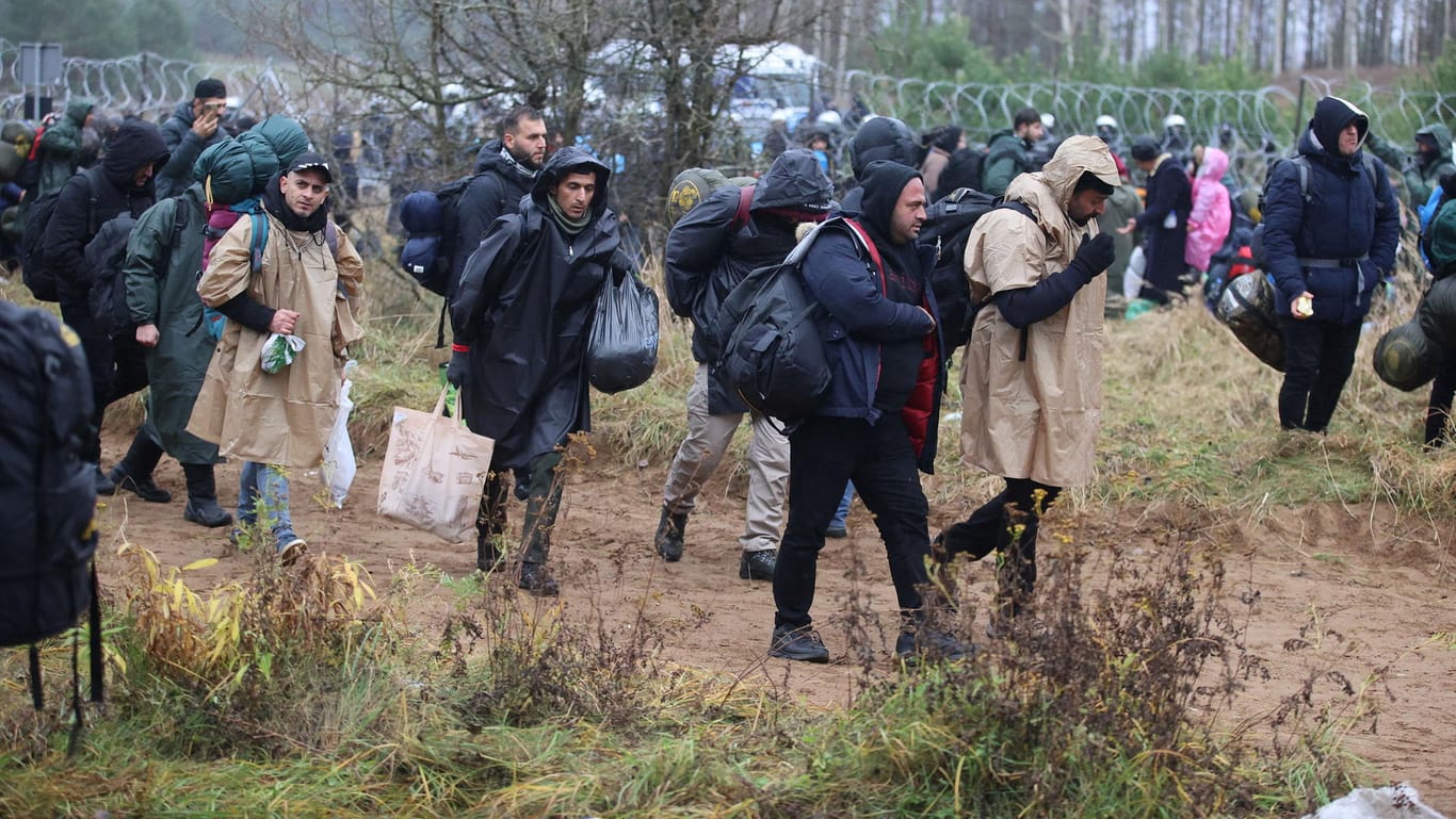 Migranten an der belarussischen Grenze zu Polen: Deutschland gilt als eines ihrer Hauptziele.