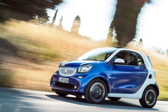 Zweisitzer für Minimalisten: Der Smart Fortwo ist für einen Kleinwagen zwar geräumig, viel Gepäck ist naturgemäß bei rund 2,70 Meter Länge aber auch nicht drin.