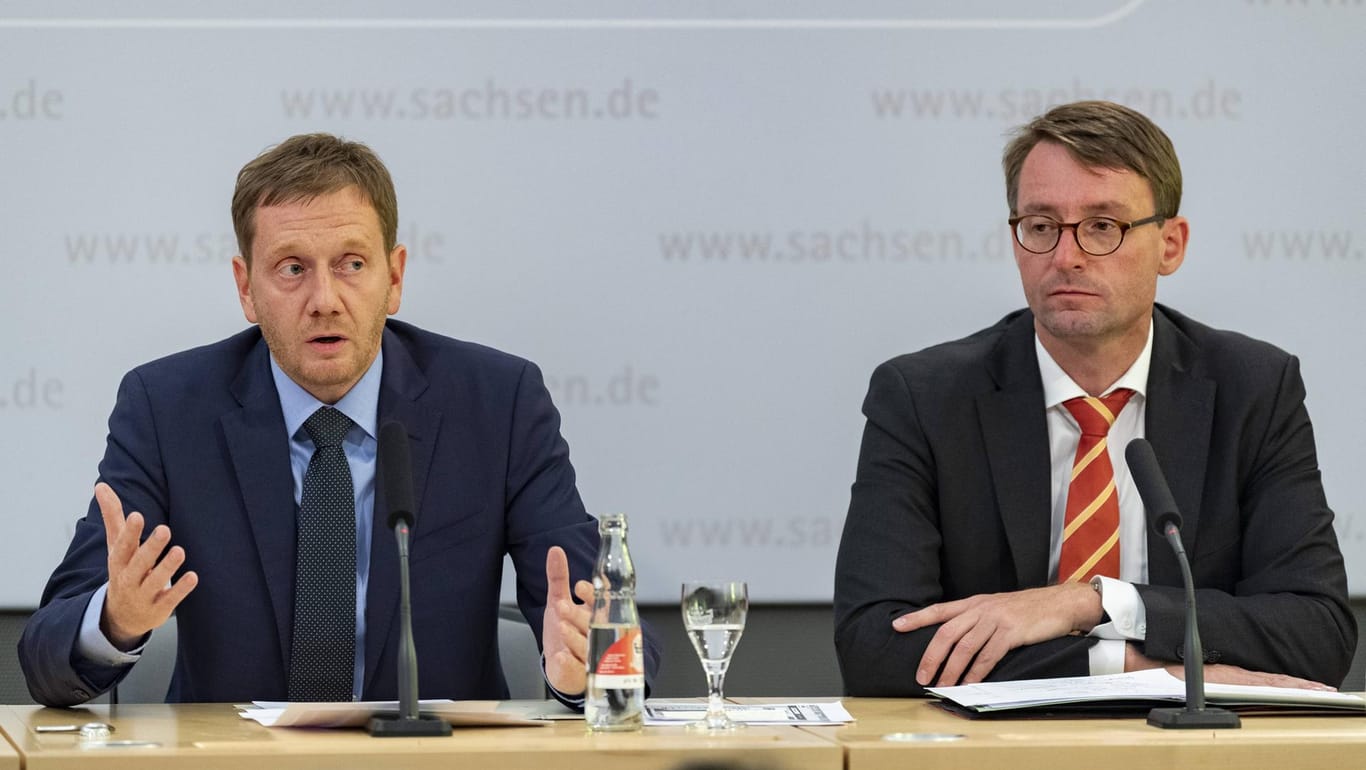 Kretschmer und Wöller bei einer Pressekonferenz im August 2018: Ausschreitungen in Chemnitz sorgten für bundesweite Kritik an der Polizeistrategie.