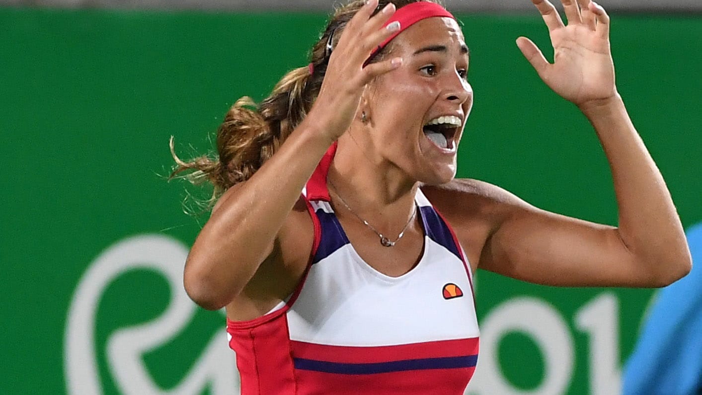 Im Freudentaumel: Monica Puig kann ihren Triumph im Tennis-Finale über Angelique Kerber kaum fassen.