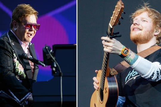 Sir Elton John (l) und Ed Sheeran sind gemeinsam ins Rennen um den Weihnachtshit des Jahres gegangen.