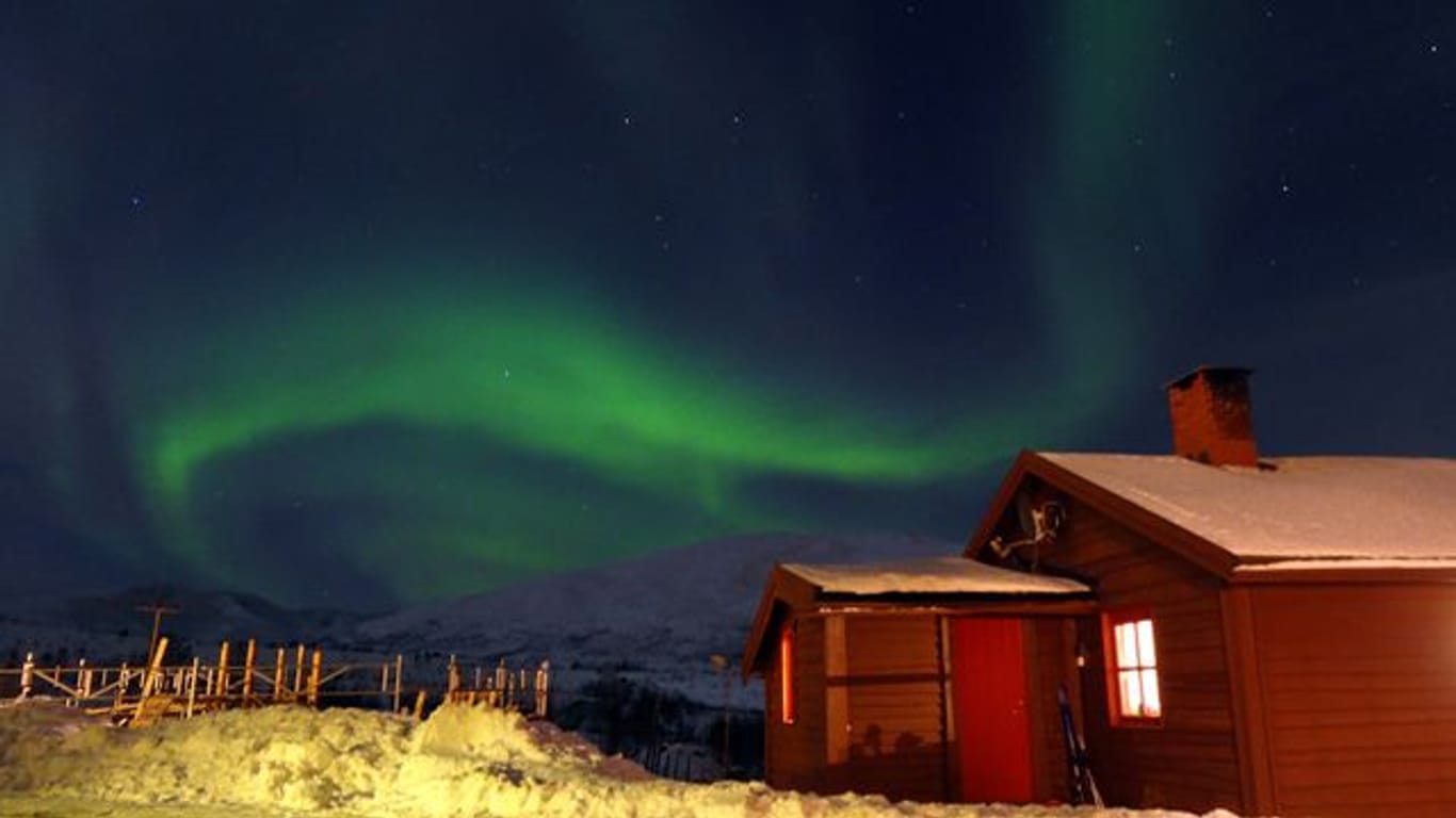 Aurora Borealis über Tromsö: Die skandinavischen Länder sind dafür bekannt, dass besonders häufig Nordlichter zu sehen sind.