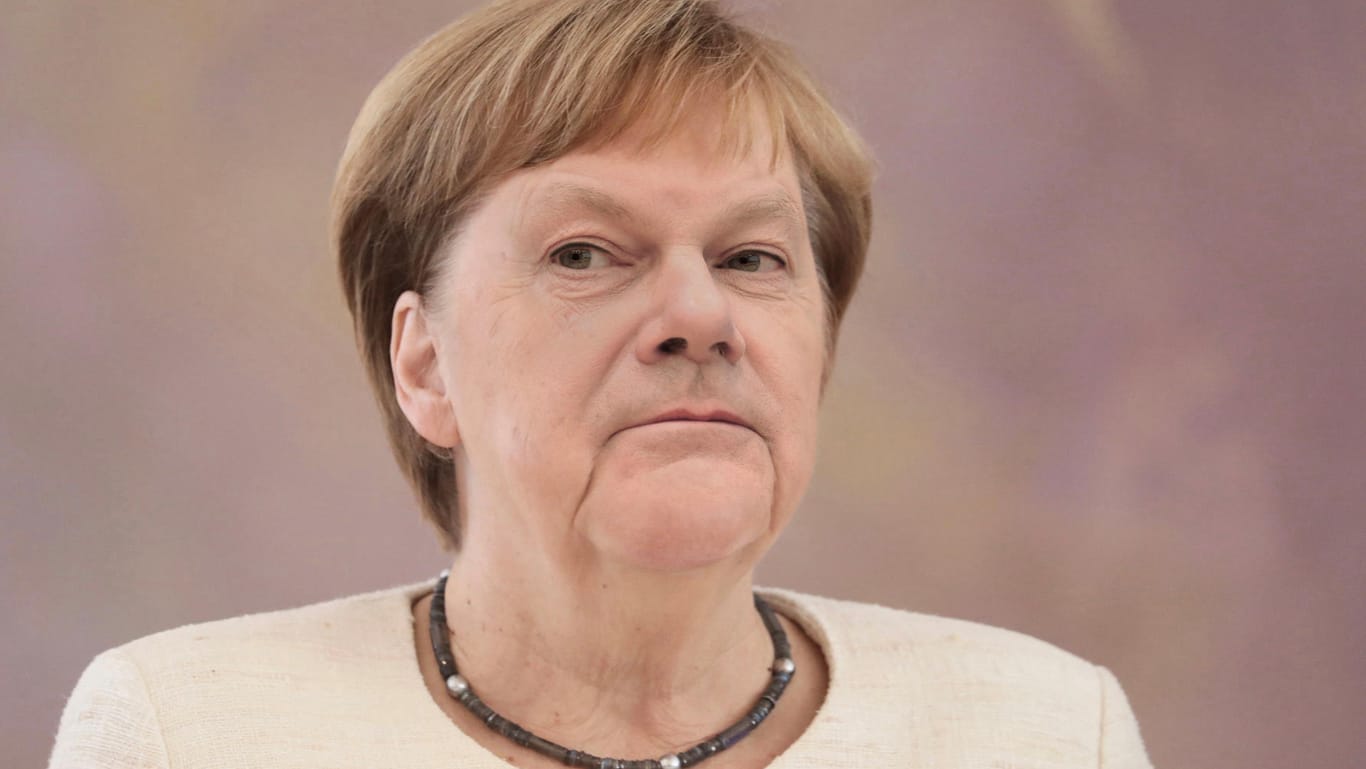 Schmerkel? Künstler Guillaume Titus-Carmel hat Olaf Scholz und Angela Merkel zum Wechsel im Bundeskanzleramt vereint.