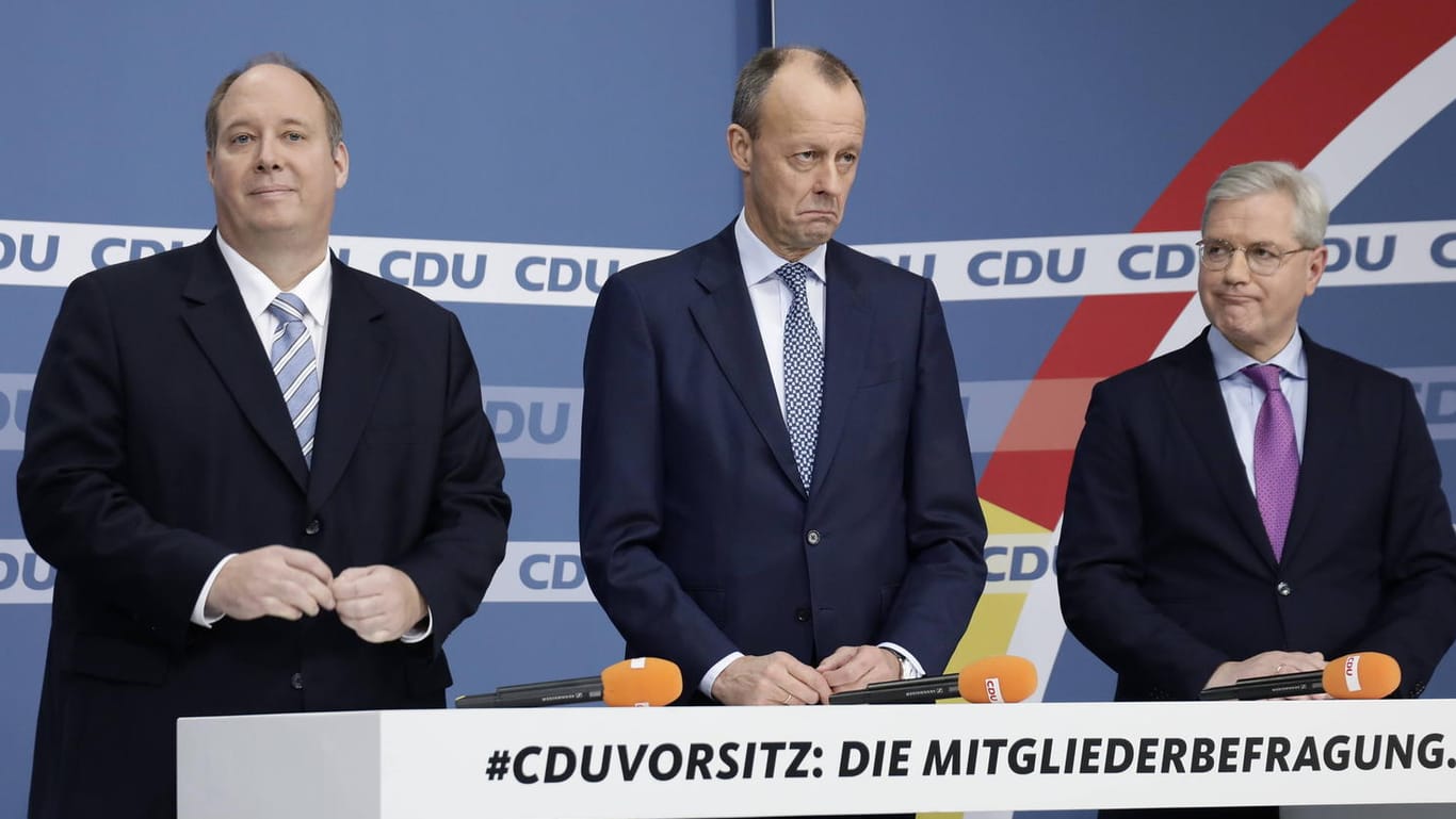 Helge Braun (l), Friedrich Merz (m) und Norbert Röttgen (r): Die CDU-Männer müssen sich einem Problem stellen.