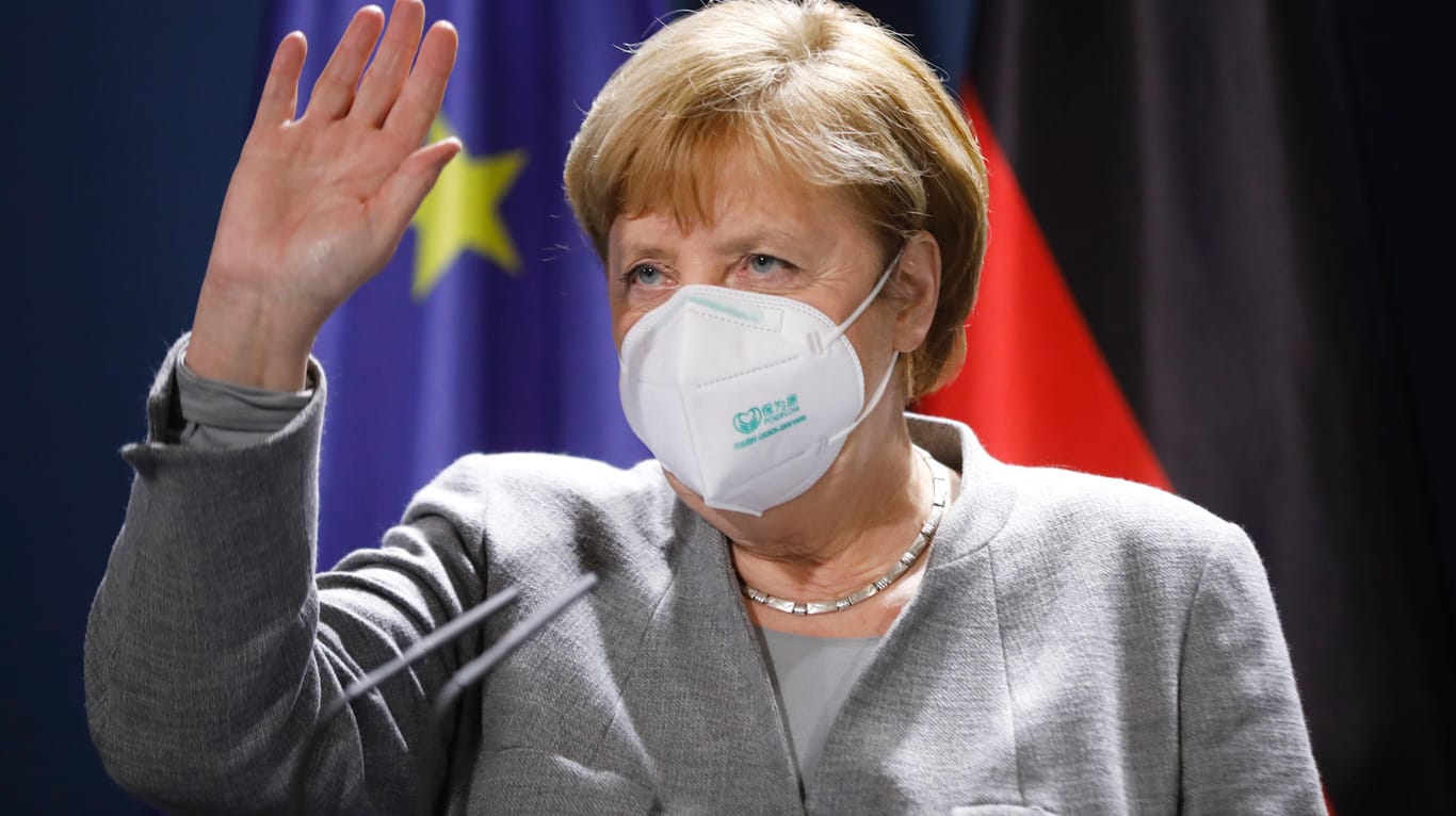 Angela Merkel mit Maske: Beim Corona-Gipfel wird es heute darauf ankommen, was die Kanzlerin der Bevölkerung sagt.