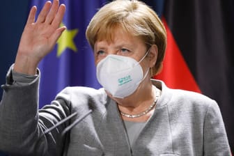 Angela Merkel mit Maske: Beim Corona-Gipfel wird es heute darauf ankommen, was die Kanzlerin der Bevölkerung sagt.
