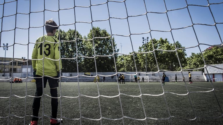 Boy as soccer goalkeeper model released Symbolfoto PUBLICATIONxINxGERxSUIxAUTxHUNxONLY SKCF00292