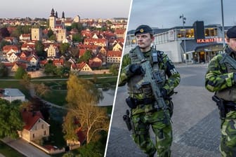 Die Stadt Visby auf der schwedischen Insel Gotland, zwei schwedische Soldaten auf der Insel (Archivbild): Immer mehr Militär bezieht auf Gotland Stellung.