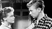 1953 drehte Hardy Krüger mit Maria Schell. In "Solange Du Da Bist" spielten die beiden in einer Liebesgeschichte nach dem Zweiten Weltkrieg.