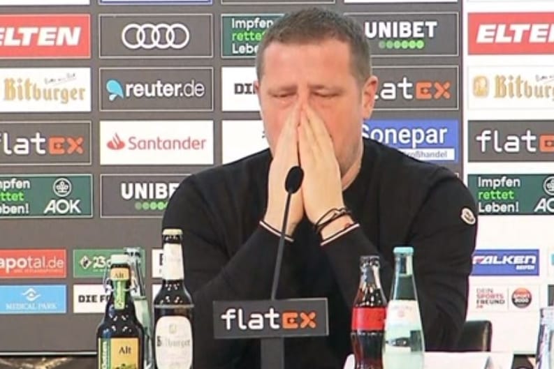 In Tränen: Max Eberl bei der Pressekonferenz in Mönchengladbach.