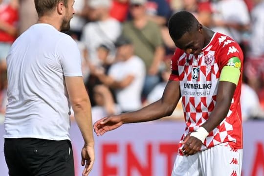 Hat eine hohe Meinung von Mainz-Coach Bo Svensson (l): Kapitän Moussa Niakhaté.