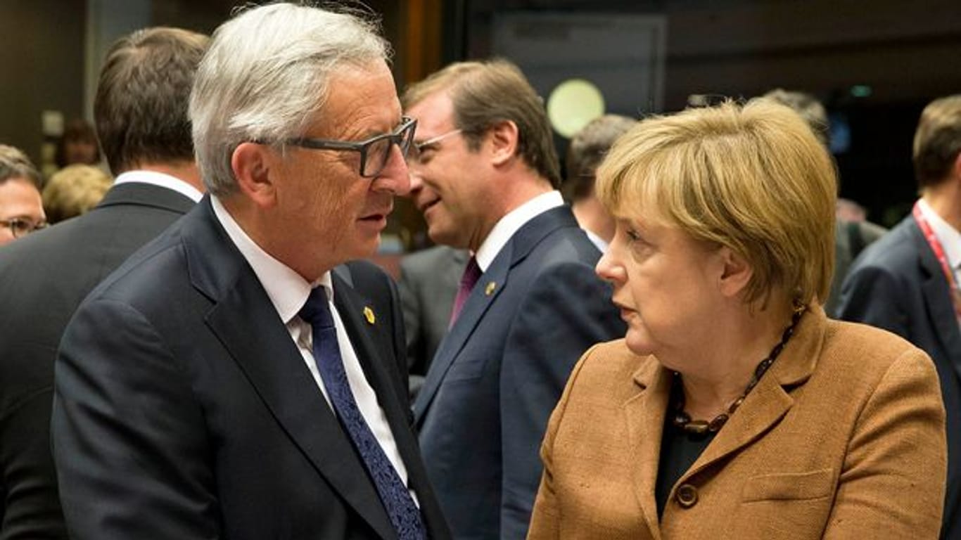 Jean-Claude Juncker und Angela Merkel.