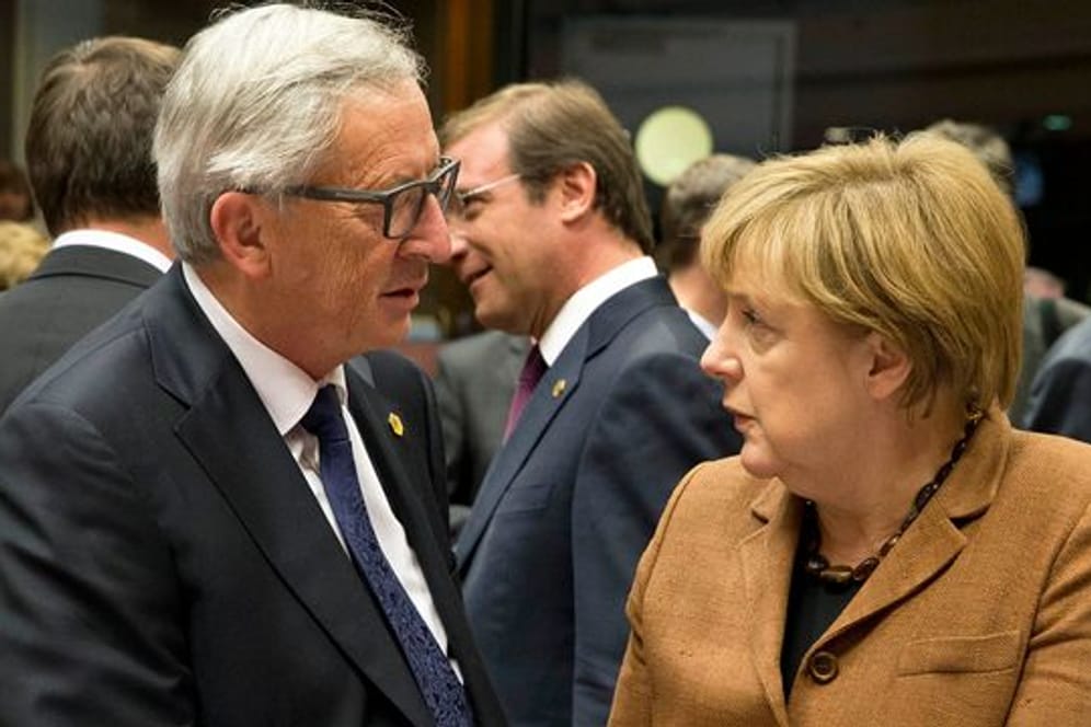 Jean-Claude Juncker und Angela Merkel.