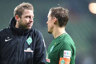 Arbeiteten schon bei Werder Bremen zusammen: Trainer Florian Kohfeldt (l) und Max Kruse.