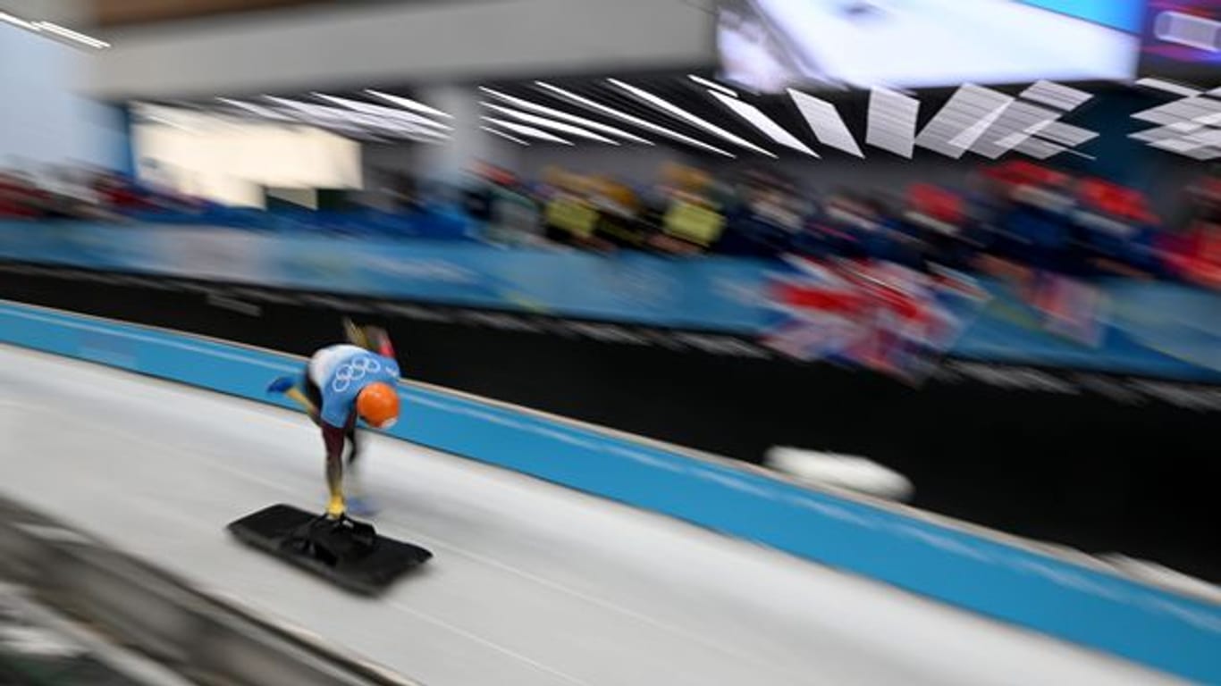 Skeleton-Weltmeister Christopher Grotheer aus Deutschland in Aktion bei den Olympischen Winterspielen in Peking.