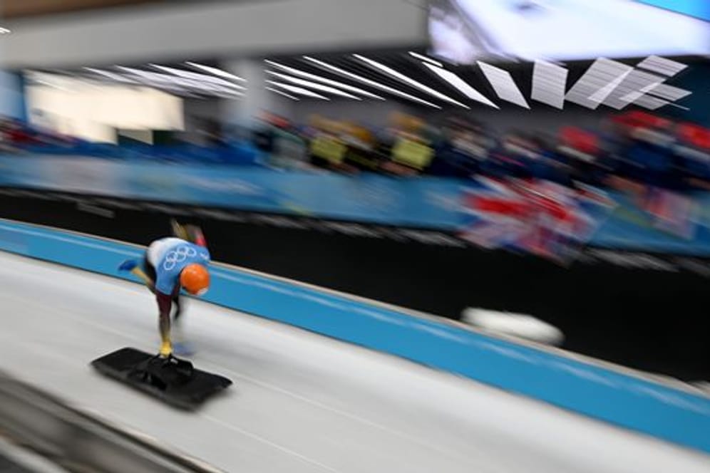 Skeleton-Weltmeister Christopher Grotheer aus Deutschland in Aktion bei den Olympischen Winterspielen in Peking.